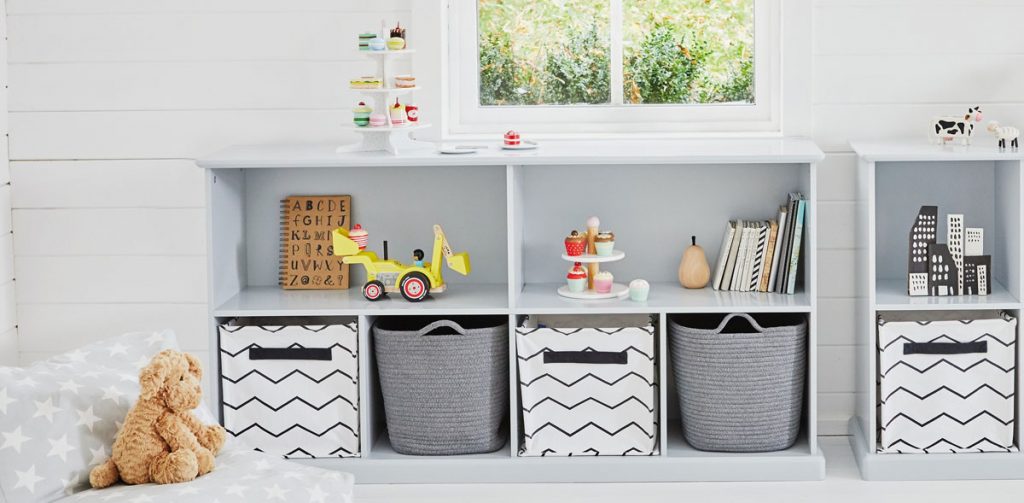 bedroom storage with grey storage baskets in bedroom