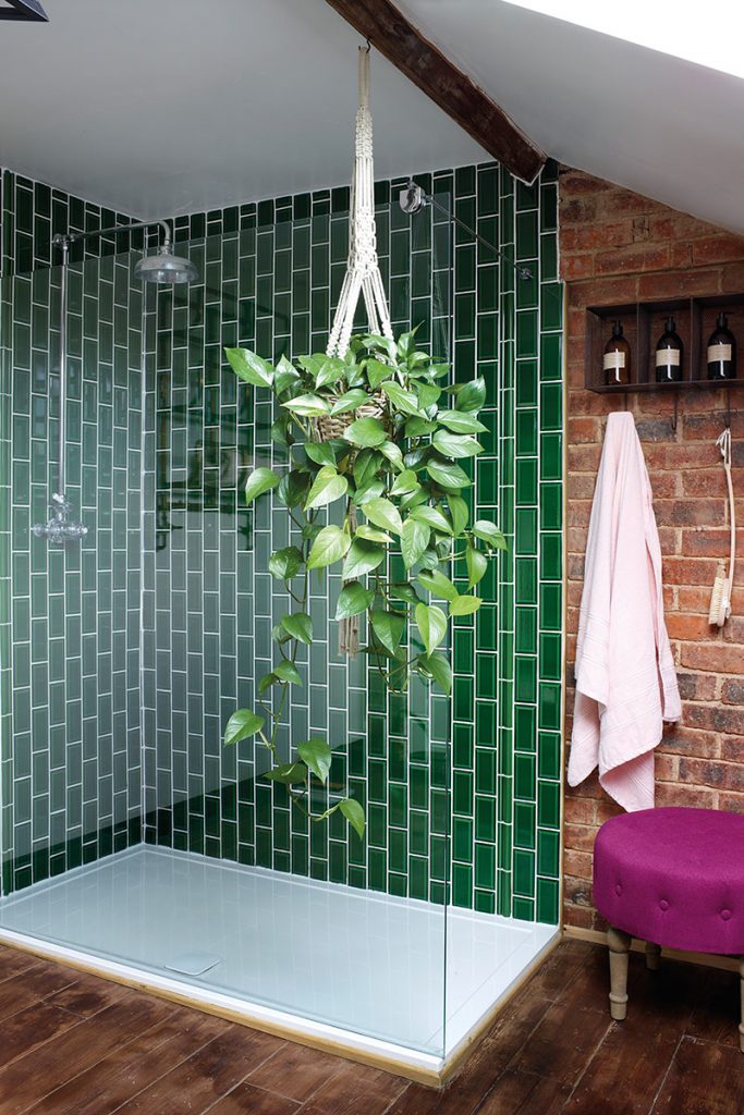 Green tiles pop against the brickwork
