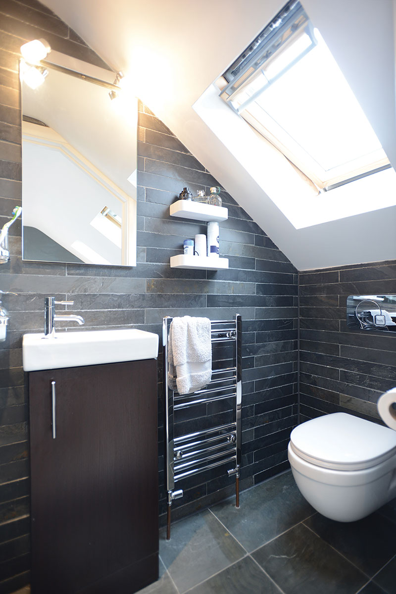 Bathroom with sloped roof