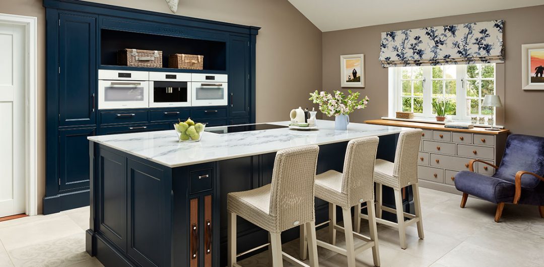 Classic dark blue kitchen in the large extension