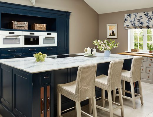 Classic dark blue kitchen in the large extension