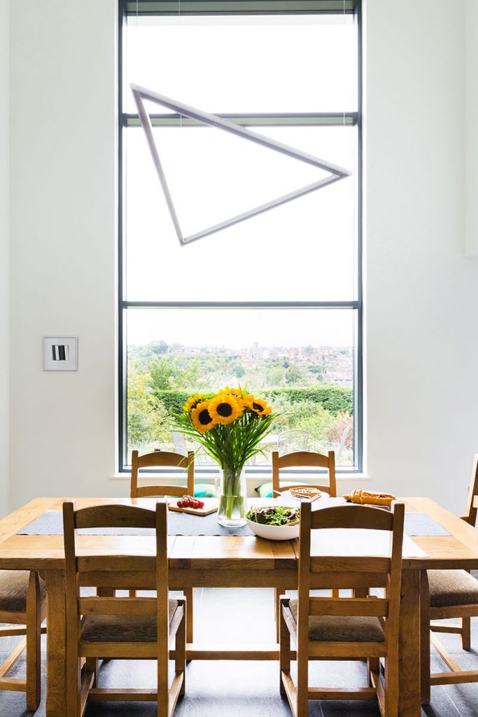 Curtain window floods the space with natural light