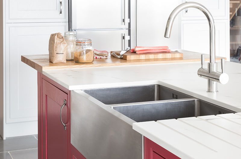 large silver fridge freezer and Belfast sink
