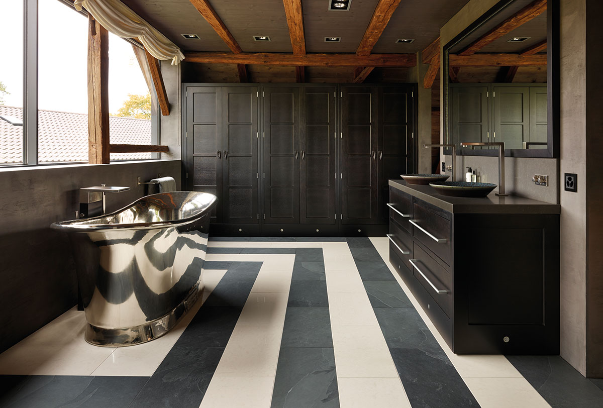 A dramatic black and white striped bathroom