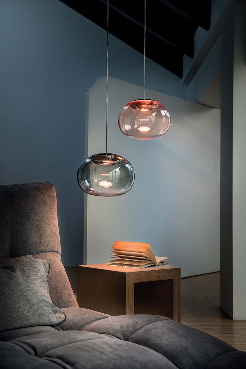 Pendant lights in cosy blue bedroom