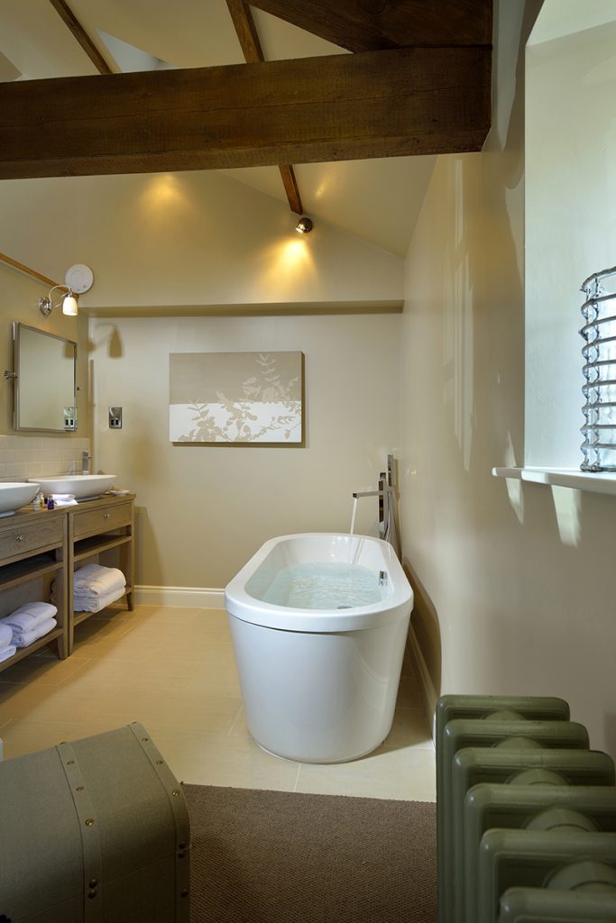 freestanding tub with running water