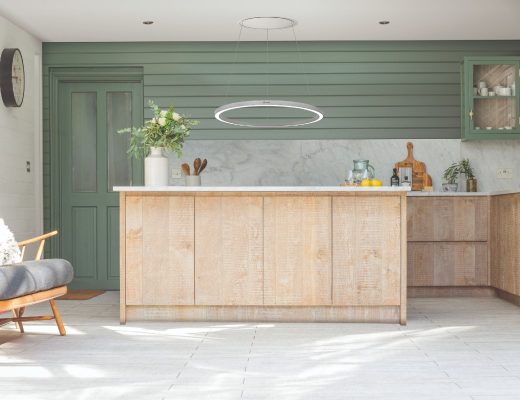 a Caple statement extractor hanging over a wooden kitchen island
