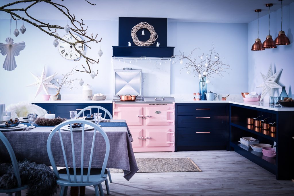 Blue kitchen design with pink Everhot range cooker 
