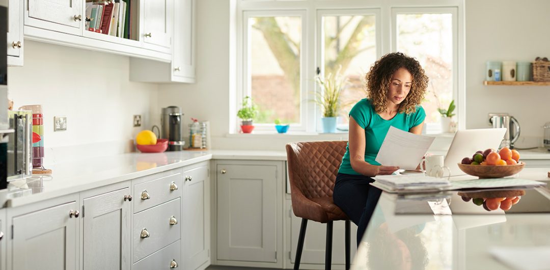 a woman researching how to buy a kitchen in lockdown