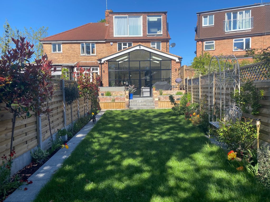 a view of a kitchen extension from the garden