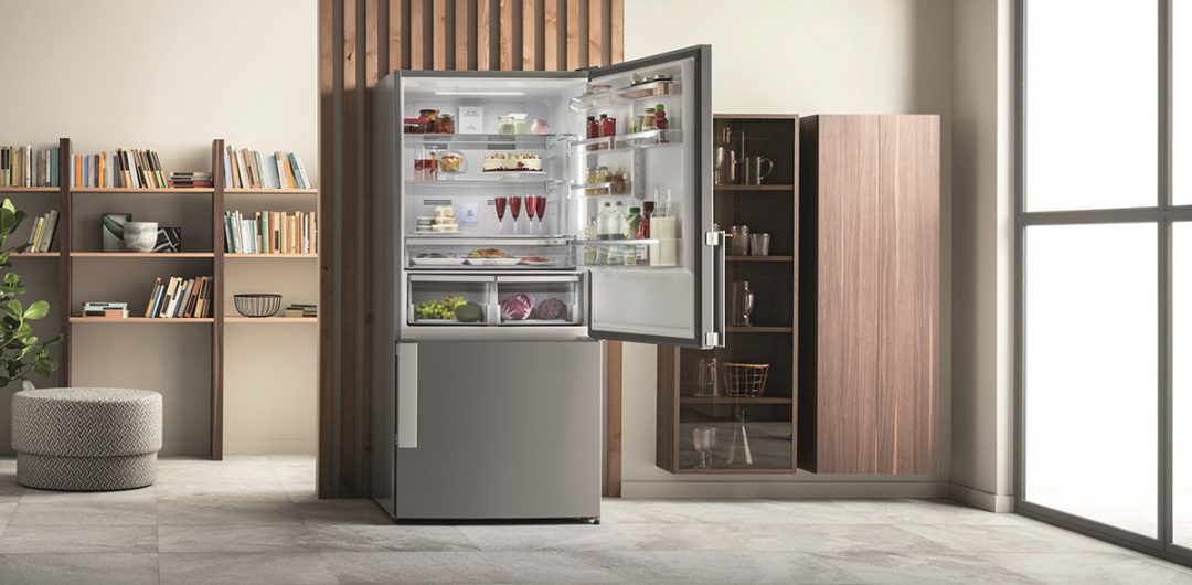 a clean fridge with the door open