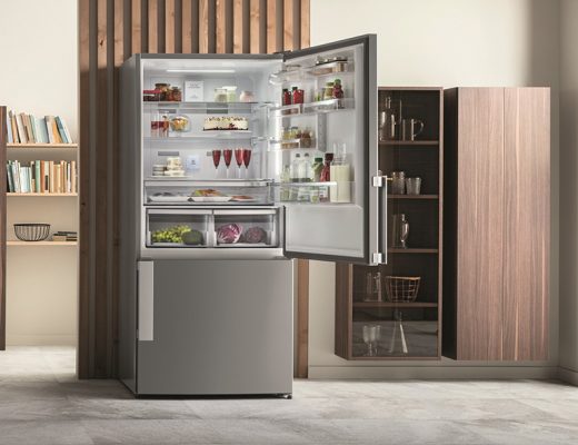 a clean fridge with the door open
