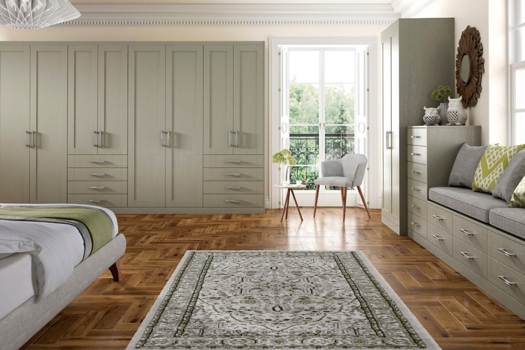 fitted wardrobes above parquet flooring