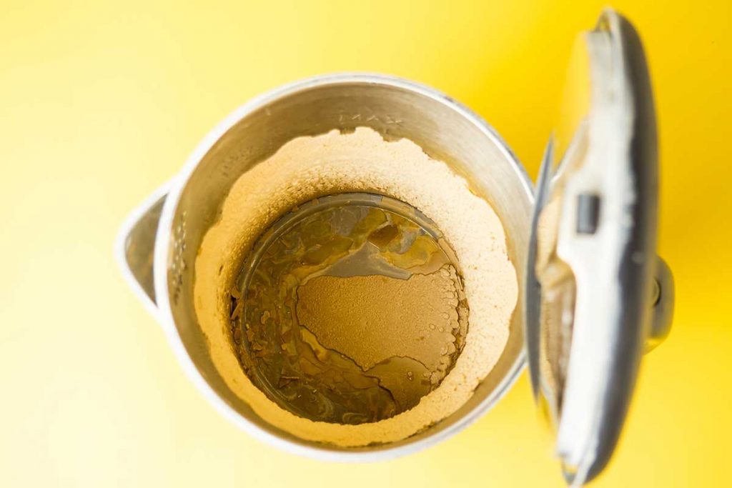 a kettle full of limescale to illustrate how to get rid of limescale