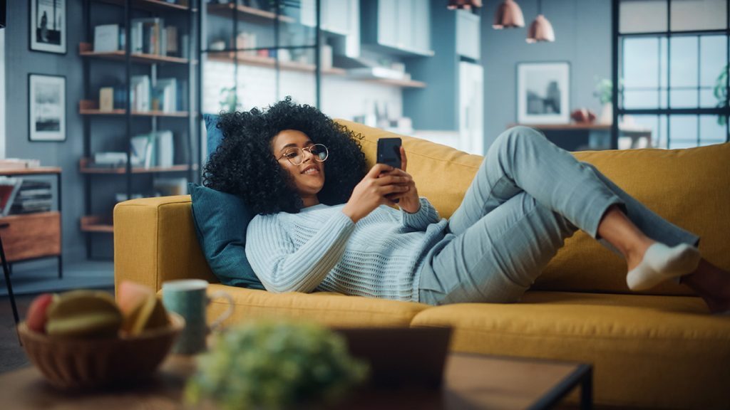 woman on phone negotiating moving house dates